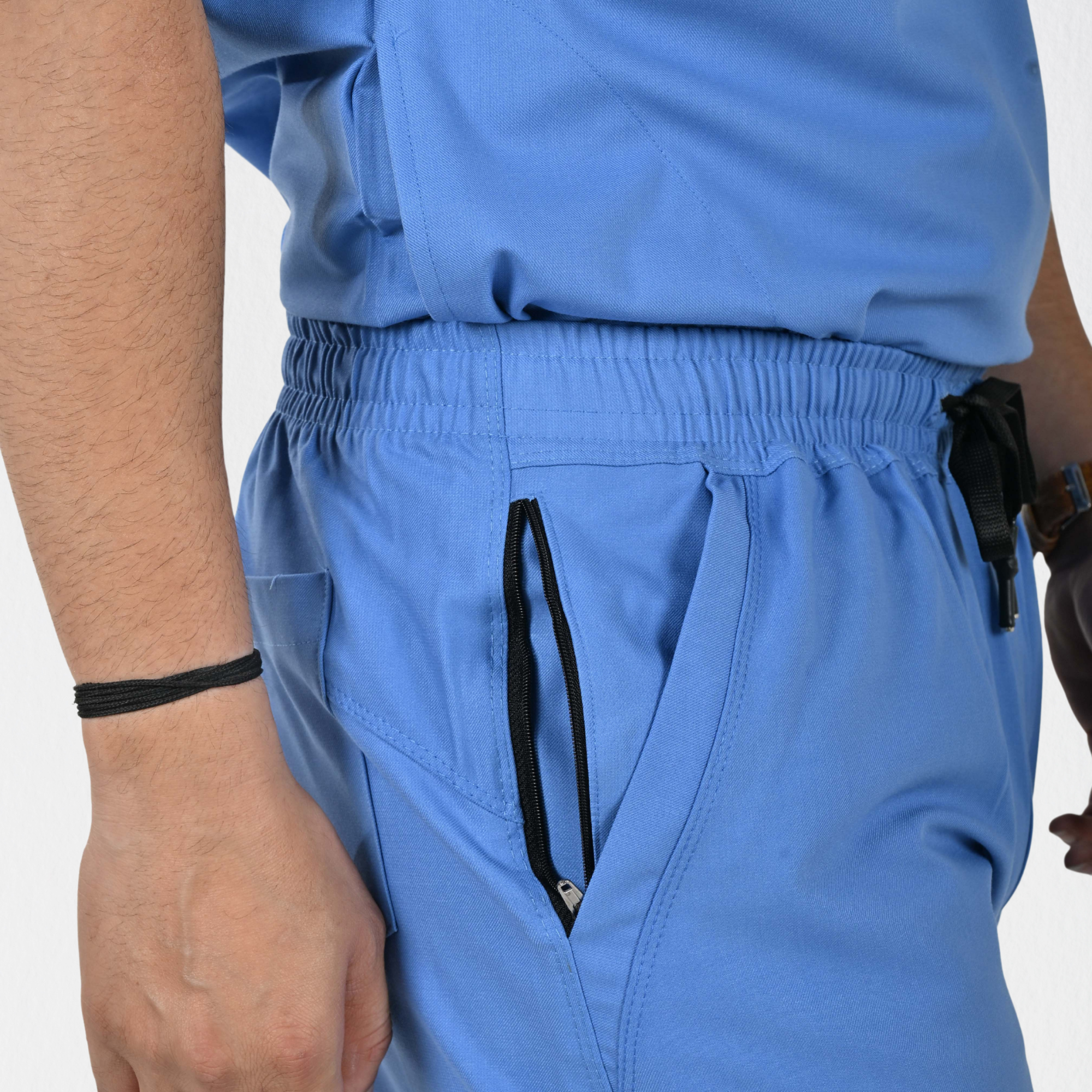 Alleda UltraFlex ciel blue scrub fabric close-up — 60% Polyester 34% Rayon 6% Spandex anti-pilling wash-stable sky blue medical scrub India