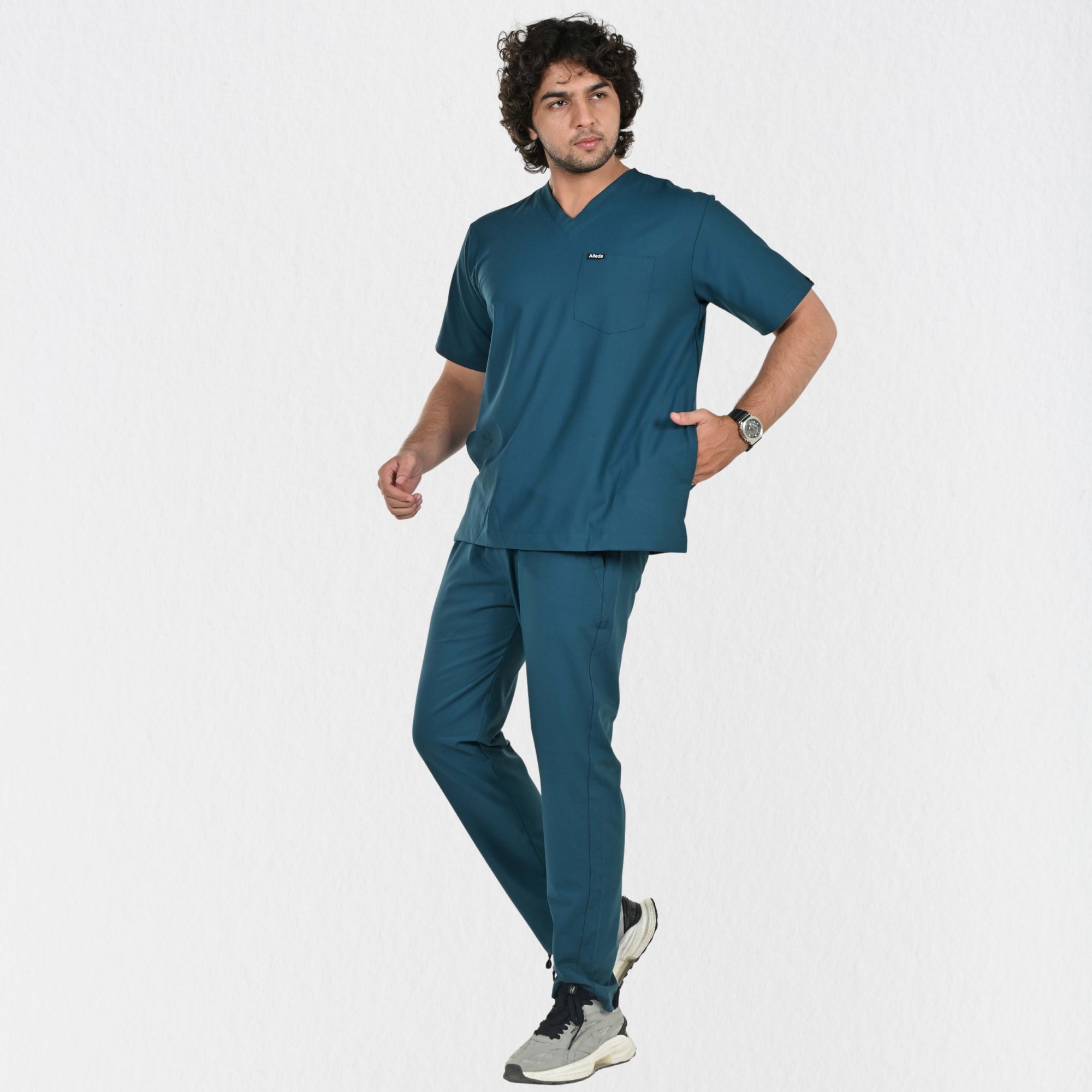 Alleda UltraFlex men's teal 4-way stretch V-neck medical scrub set — front full-body view, best teal scrubs India