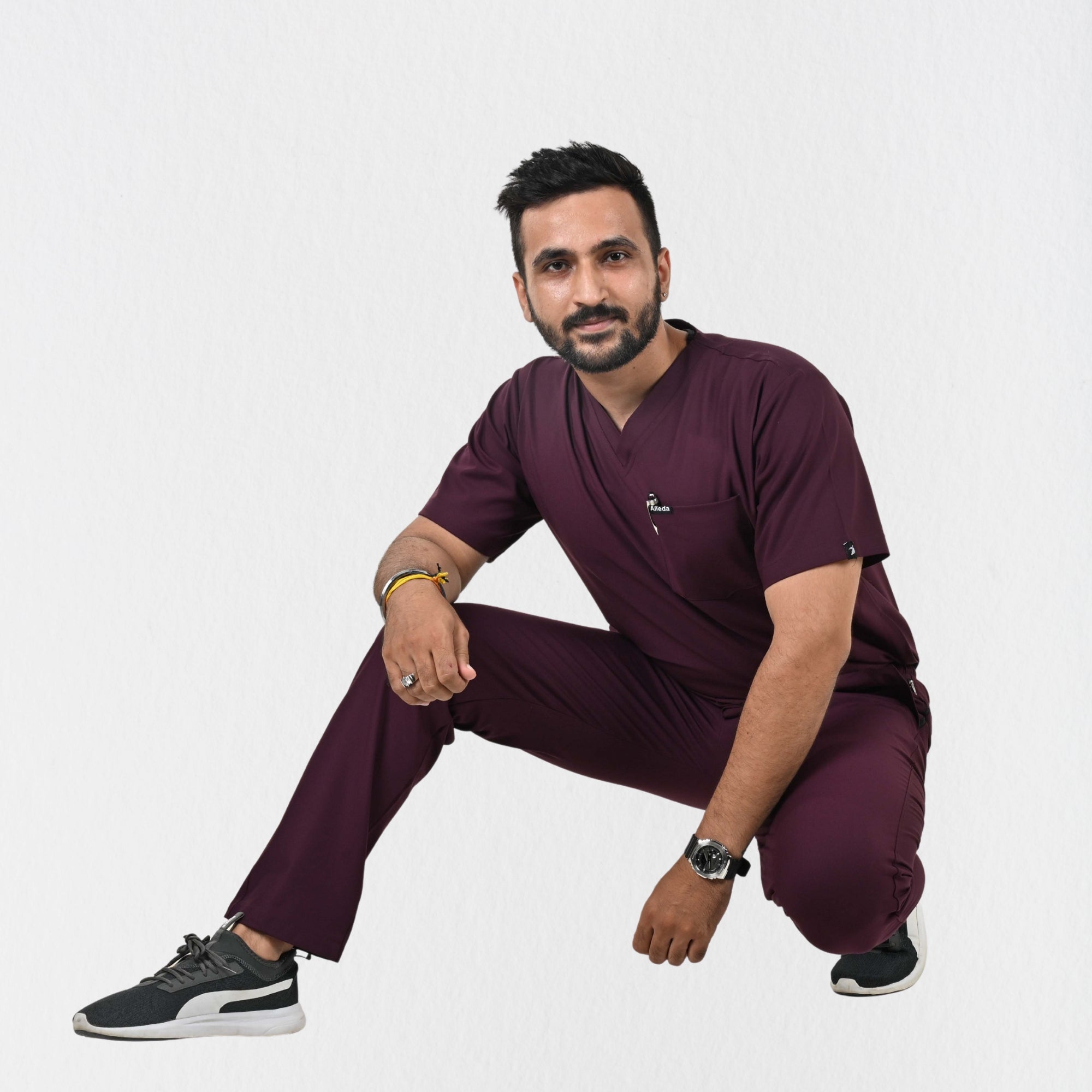 Alleda UltraFlex wine scrub top and bottom — moisture-wicking breathable clinical workwear