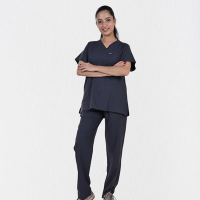 Female doctor physiotherapist wearing Alleda UltraFlex heather grey women's medical scrub set — best grey hospital workwear for women healthcare professionals India
