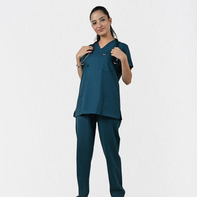 Alleda UltraFlex women's teal 4-way stretch V-neck medical scrub set — hero front full-body, independent sizing, most flattering teal scrubs for women doctors India
