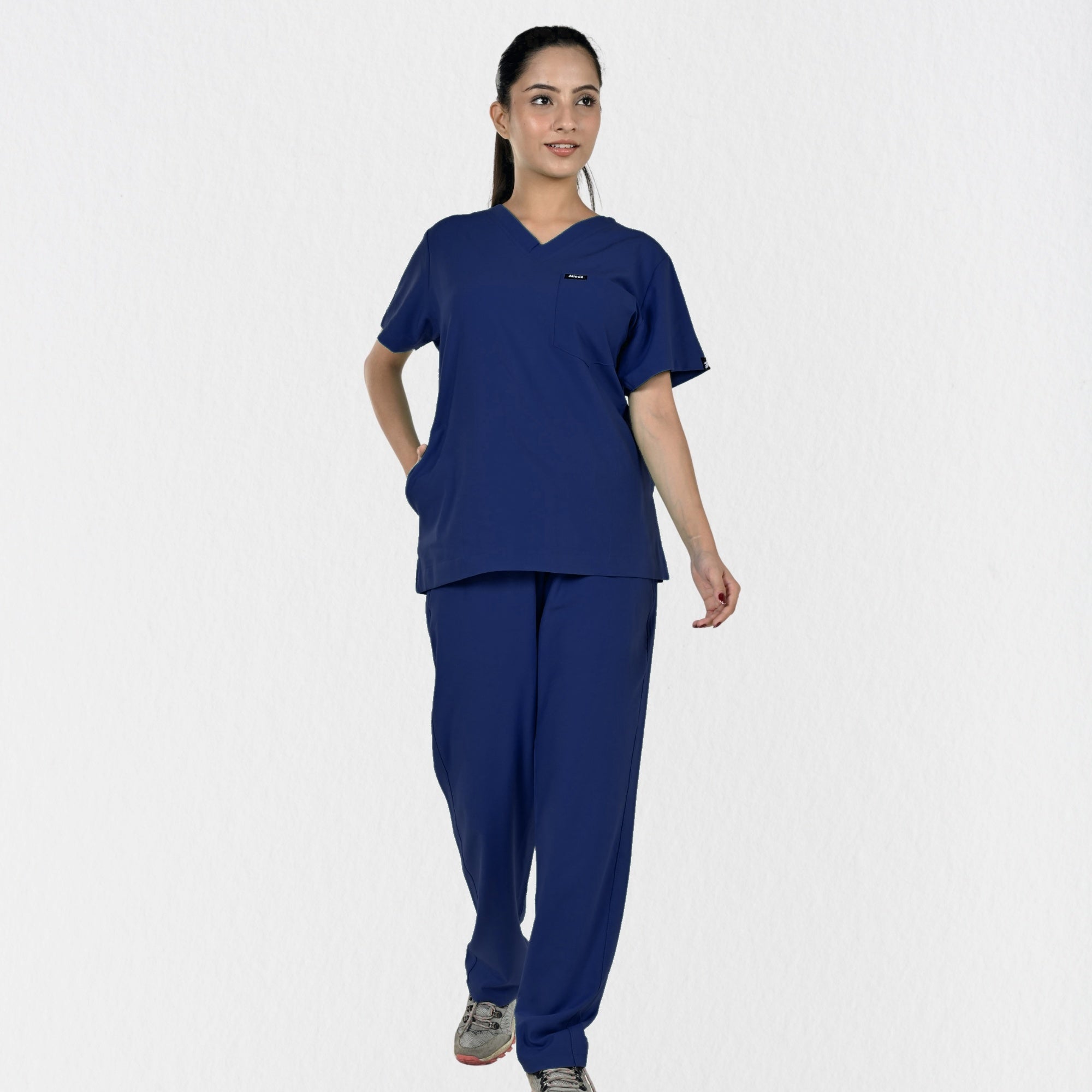 Alleda UltraFlex women's navy blue 4-way stretch V-neck medical scrub set — hero front, independent top bottom sizing, best navy scrubs for women doctors India
