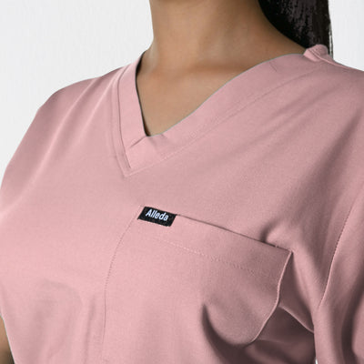 Alleda UltraFlex women's pastel pink rosy touch scrub fabric close-up — 60% Polyester 34% Rayon 6% Spandex anti-pilling soft pink women's medical workwear India
